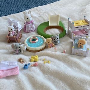 Calico critters, three sets!  Includes mom and 6 animal babies as well.